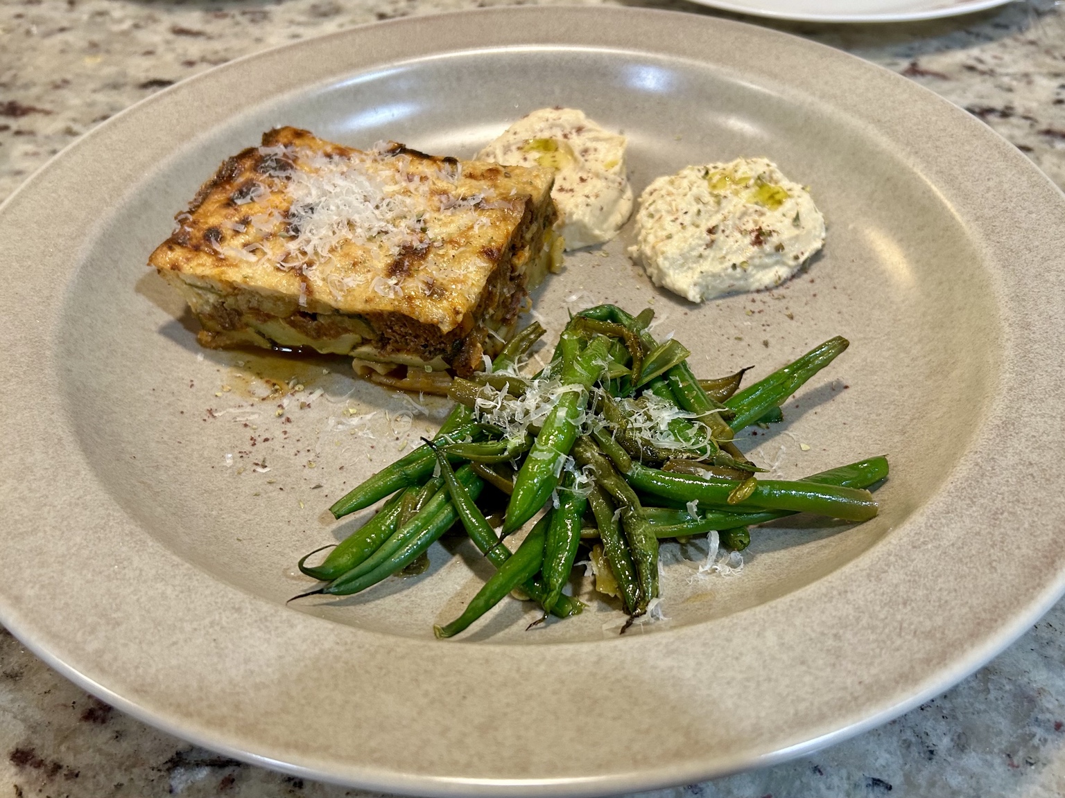 A plated square of light moussaka