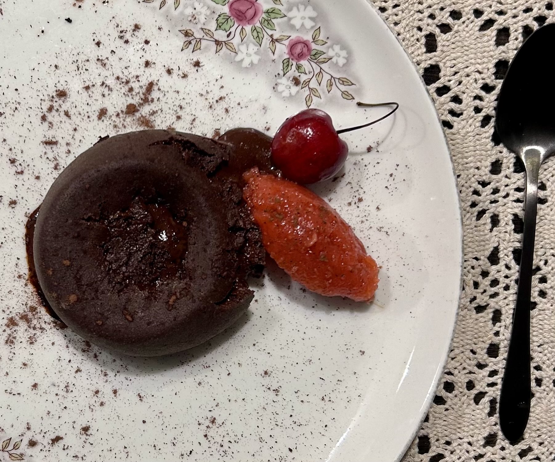 Light molten lava cake served on a floral plate