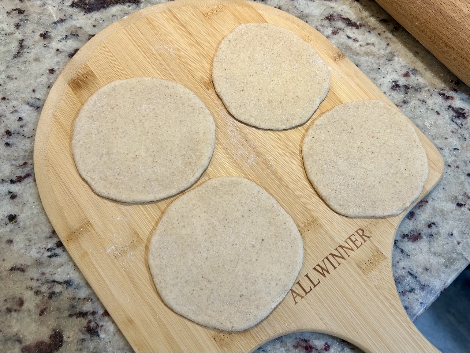 Universal discard dough shaped into small rounds for pita bread