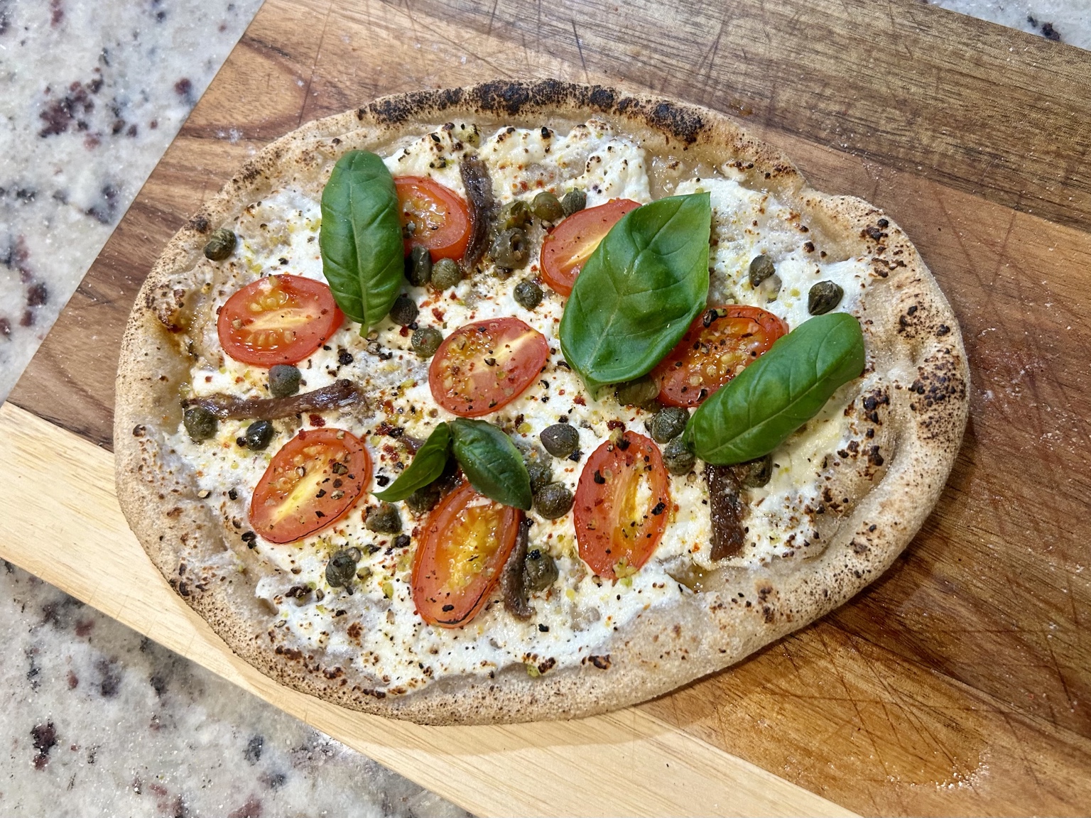 Pizza made from universal discard dough