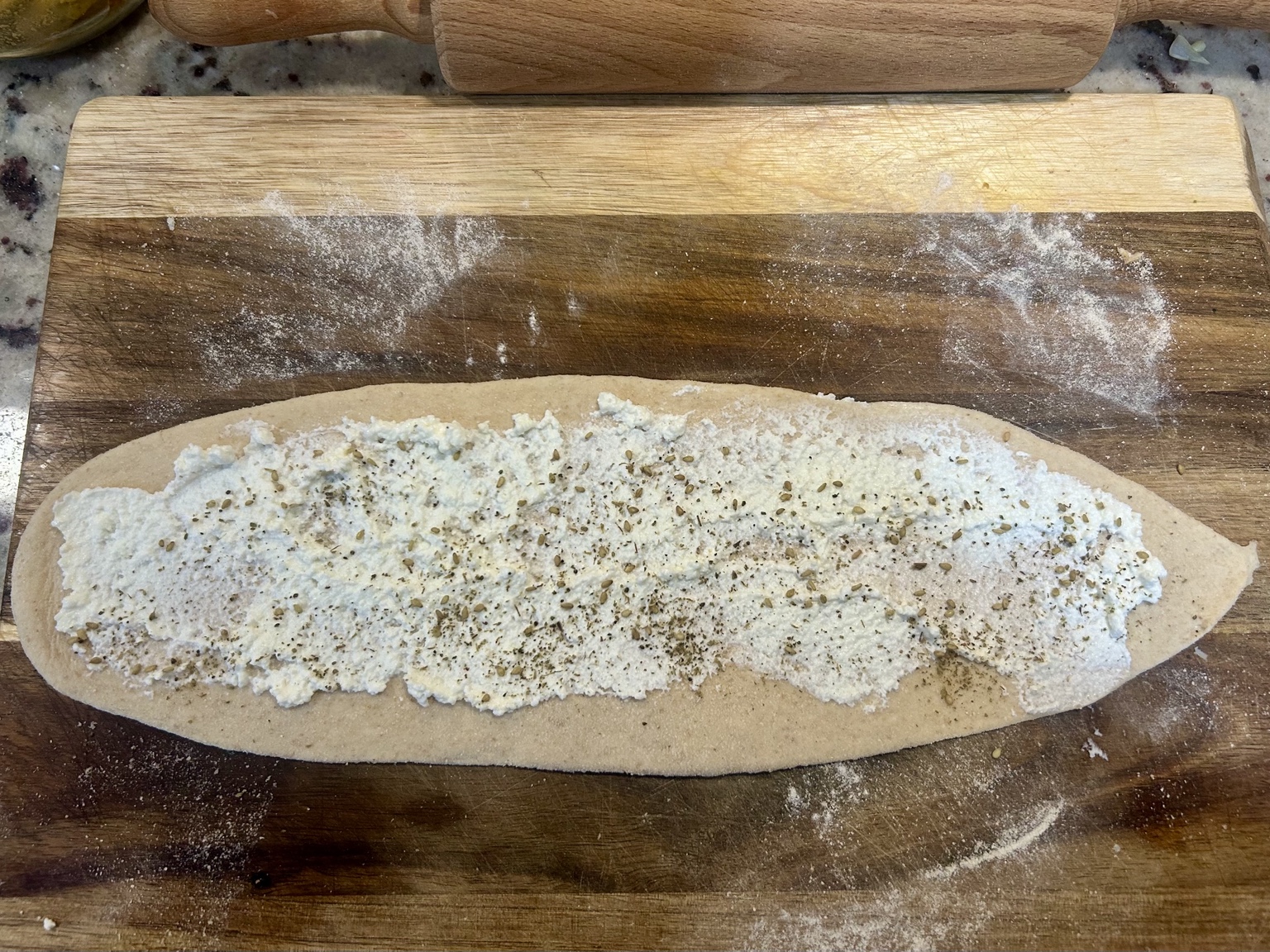 Pide dough spread with a cheese filling