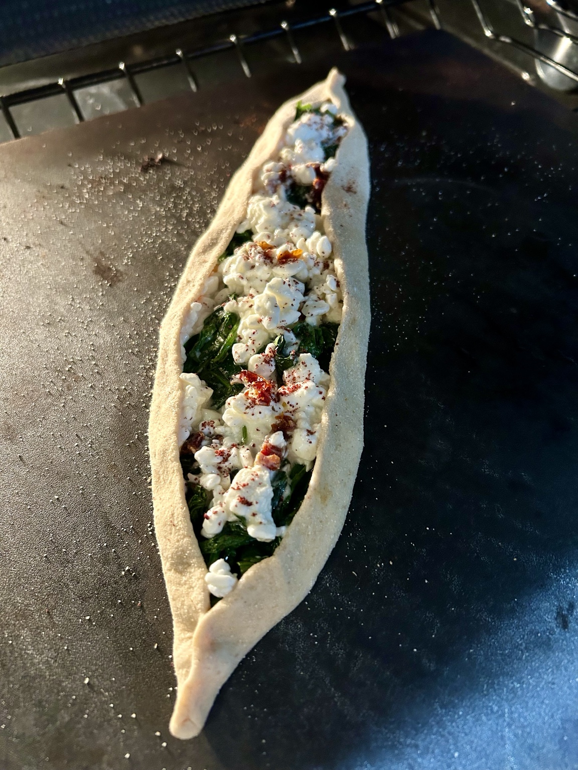 Pide shaped and filled before baking